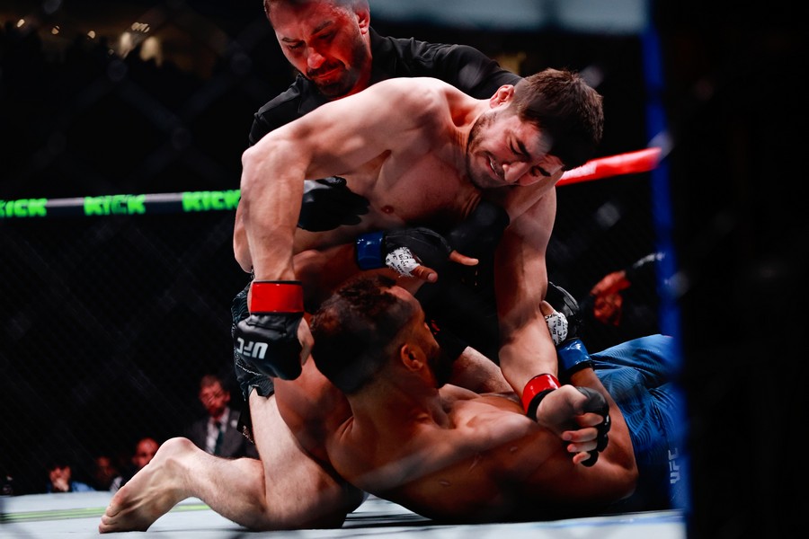Abdul-Rakhman Yakhyaev lands punches on Julius Walker before the referee stops their UFC Fight Night bout in Baku, Azerbaijan, on 27 June 2026.