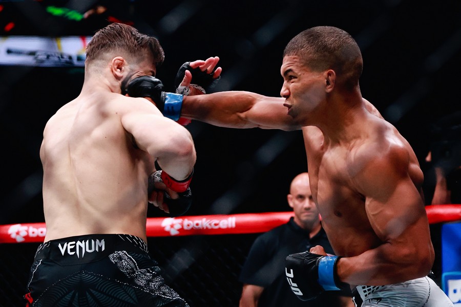 Matheus Camilo hits with a fist Nazim Sadykhov over his face